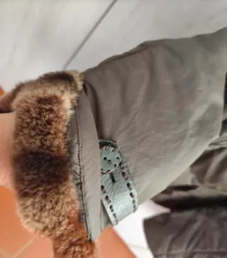 Piumino con pelliccia staccabile