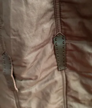 Piumino con pelliccia staccabile