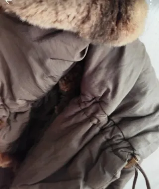 Piumino con pelliccia staccabile