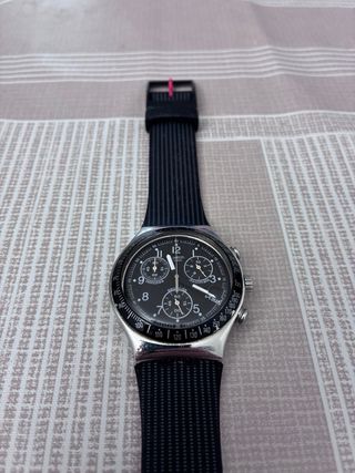 Reloj Swatch Negro y Plateado en perfecto estado