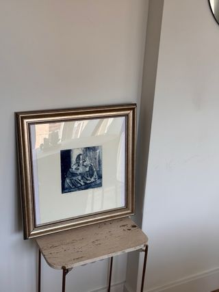 Mesa auxiliar mármol y metal