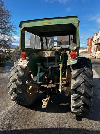 Tractor John Deere 818 con pala