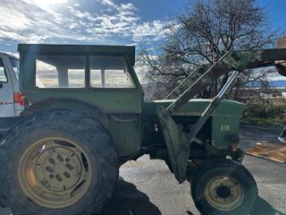 Tractor John Deere 818 con pala