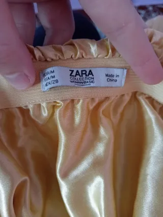 Falda dorada plisada talla M