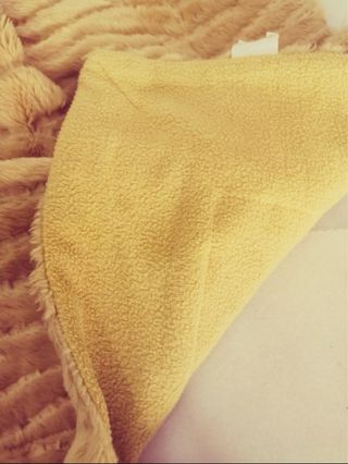 Manta de sofá reversible