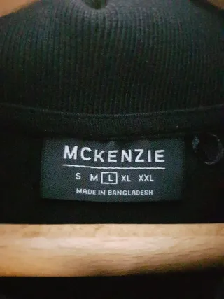 Polo McKenzie Negro y Turquesa Talla L