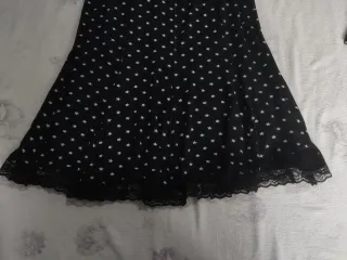 Gonna nera con stelle e collant Sanpellegrino