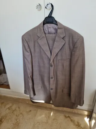 Traje versace de chaqueta y pantalón gris