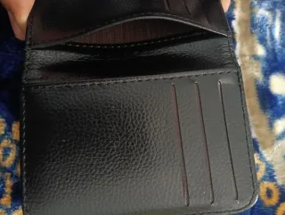 Cartera de piel negra Nueva