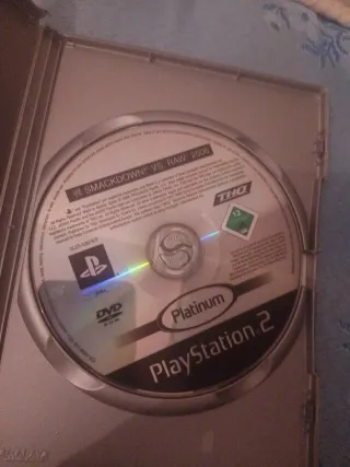 Juego PS2 Madagasccar y smack VS raw(wwe).