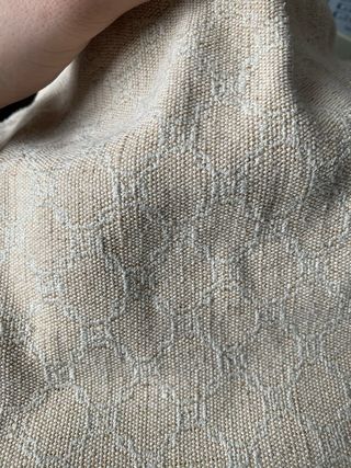 Bolso de mano beige y marrón