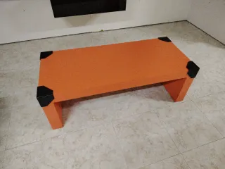 Mesa de centro naranja y negra de 120x51