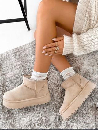 Botas de pelo beige