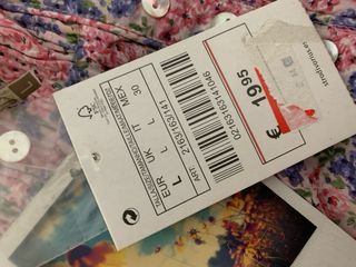 Camisa floral rosa y morada