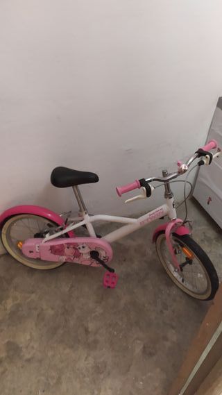 Bicicleta infantil Btwin rosa y blanca