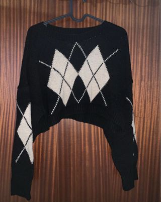 Camisola preta e bege com padrão argyle