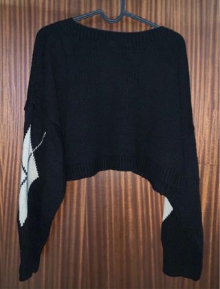 Camisola preta e bege com padrão argyle