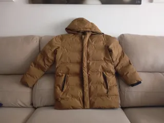 Plumas niño marrón