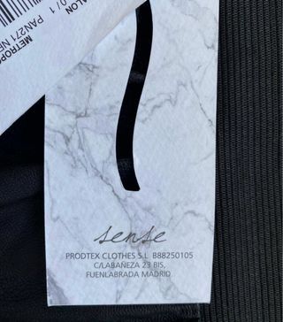 Pantalones tipo falda patalon negros efecto piel