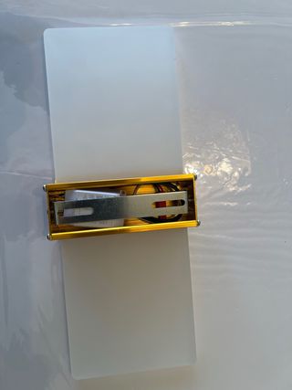 Lámpara de pared moderna dorada