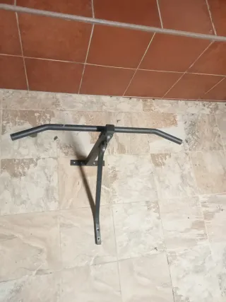 Barra de dominadas pared