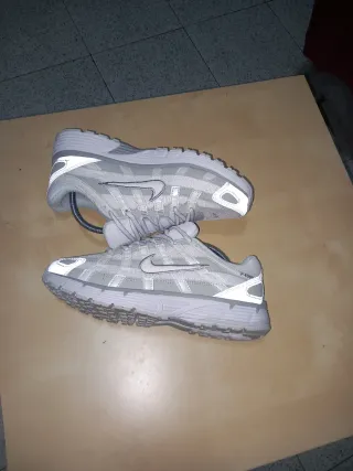 Nike P6000 grises y blancas