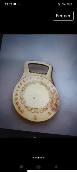 Abrebotellas con medalla Christophe