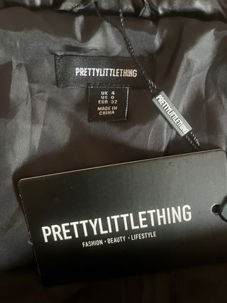 Plumífero negro corto