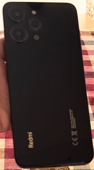 Móvil Xiaomi Redmi 12 + Cargador
