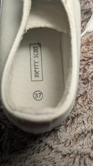 Zapatillas blancas tobilleras