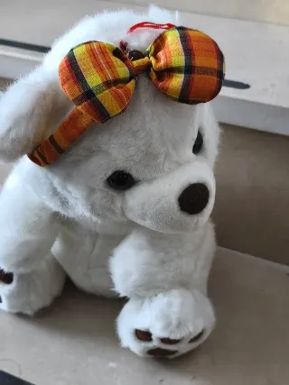Orsacchiotto peluche bianco con fiocco