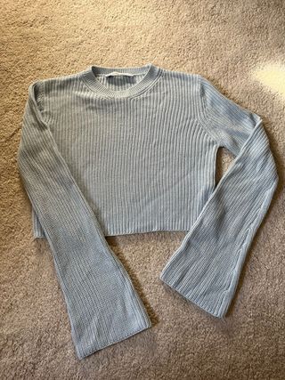 Jersey de punto azul manga acampanada