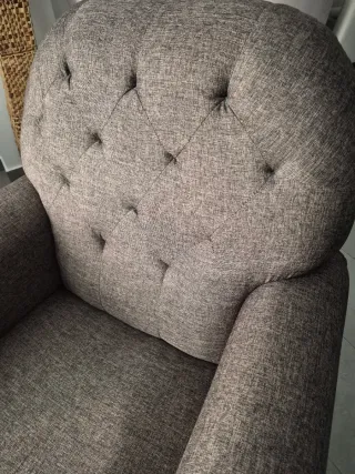 Sillón tapizado tela