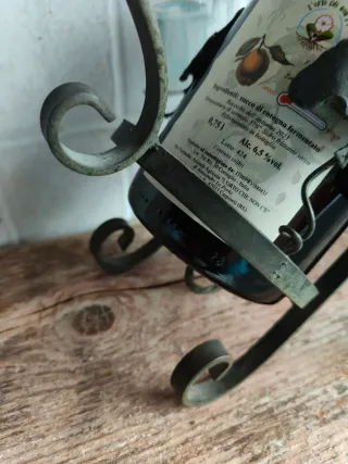 Portabottiglie in ferro battuto con catena