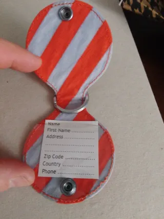 Portachiavi rotondo a righe diam 7 cm