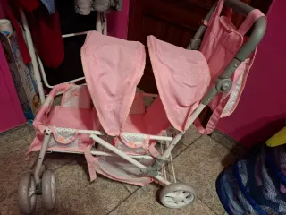 Carrito de muñecas doble rosa