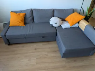 Sofá cama gris con chaise-lounge