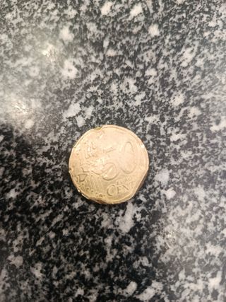 Moneda 50 céntimos 2002 con defecto acuñado