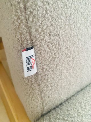 Silla mecedora madera y tela gris