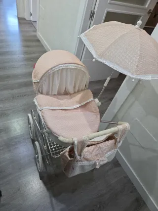 Carrito de bebé de juguete rosa marca Arias