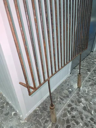 Parrilla antigua para chimenea