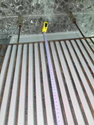 Parrilla antigua para chimenea