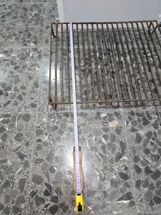 Parrilla antigua para chimenea