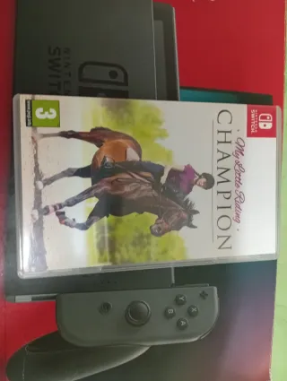 Nintendo Switch gris y rosa + 2 juegos.
