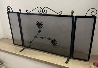 Parascintille camino ferro battuto decorato