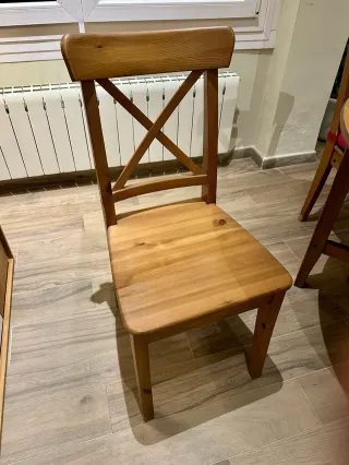 Mesa de comedor redonda de madera extensible