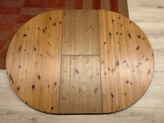 Mesa de comedor redonda de madera extensible
