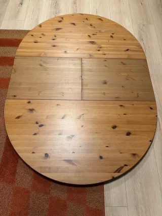 Mesa de comedor redonda de madera extensible