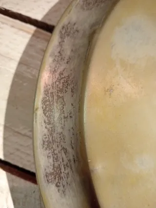 Tapa antigua para servir comida