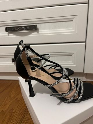 Tacchi con glitter neri e argento